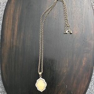 Goldtone Pendant Necklace with Crystal Accents